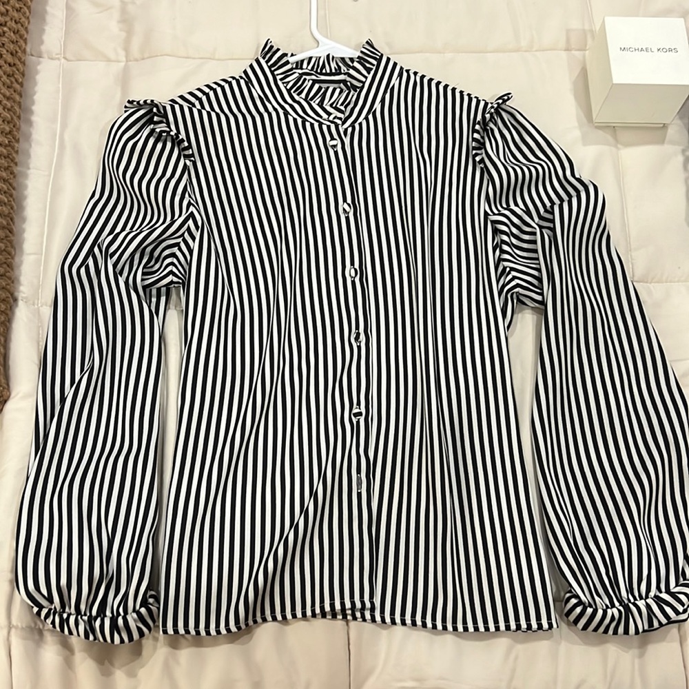 Striped long sleeve dress shirt.